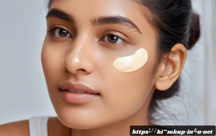 촉촉한 스킨 틴트 파운데이션 추천 - A close-up portrait of a young Indian woman with glowing, hydrated skin applying a lightweight skin ...